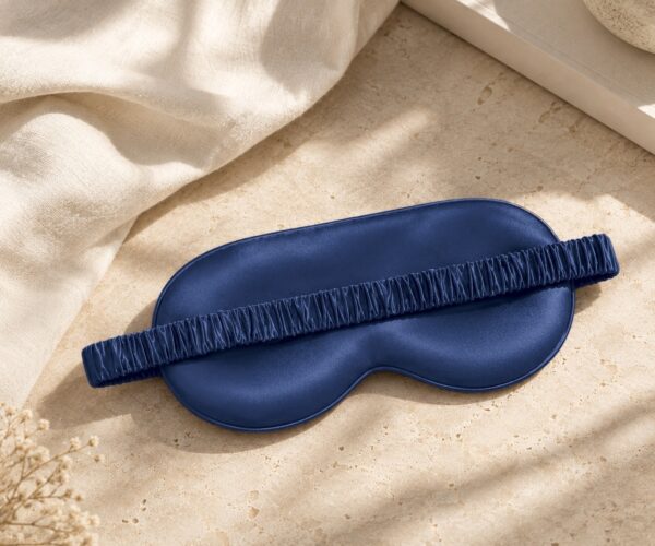Navy Classic mulberry silk eye mask on linen and stone