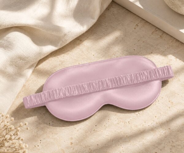 Pink Classic mulberry silk eye mask on linen and stone