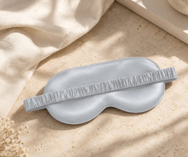 Silver Grey Classic mulberry silk eye mask on linen and stone