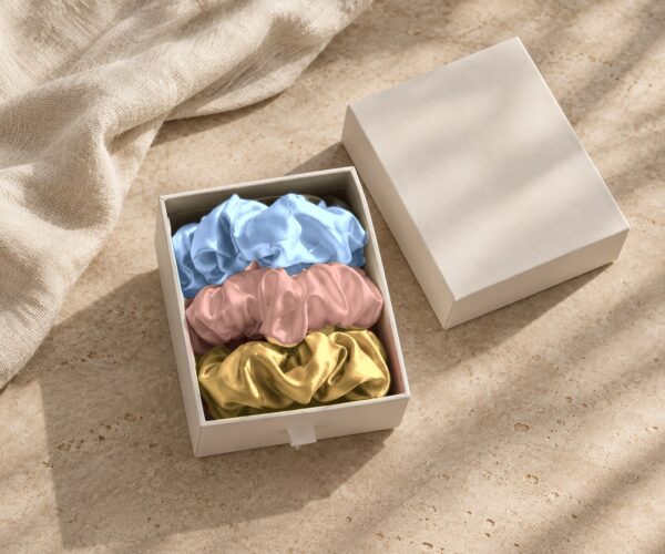 Curio Silk silk scrunchie gift box in baby blue gold rose gold