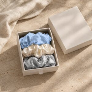 Baby blue, white and silver mulberry silk scrunchies in a white gift box