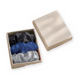 Curio Silk silk scrunchie gift box in black silver blue on a white background